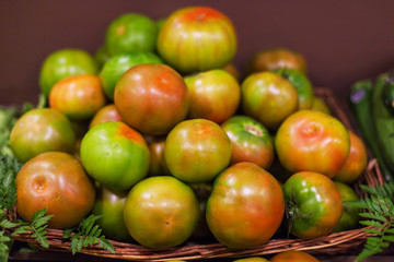 Fresh tomatoes  background. Organic Ripe various tomatoes in market. Harvesting concept.