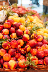 Organic Fresh nectarines in the market.  Nectarine harvest.  Food background