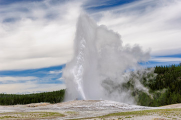 Eruption of Old Faithful geyser in Yellowstone National Park, Wyoming.