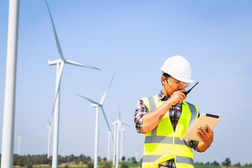  Engineers are investigating the wind turbine.