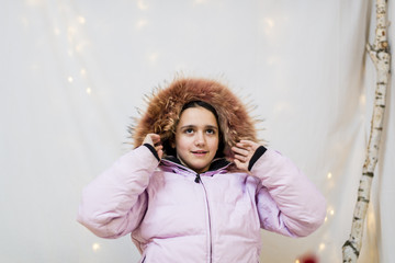 portrait of teenager in studio with anorak © Emanuele Capoferri
