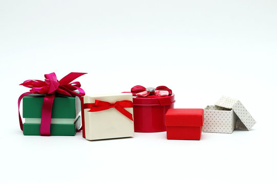 Several multi-colored gift boxes on a white background