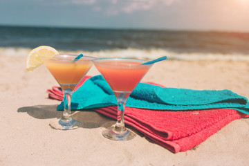 Summer concept: fresh exotic cocktail on the beach