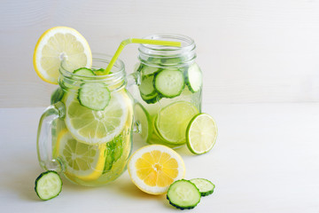 detox citrus cucumber water in glass jars