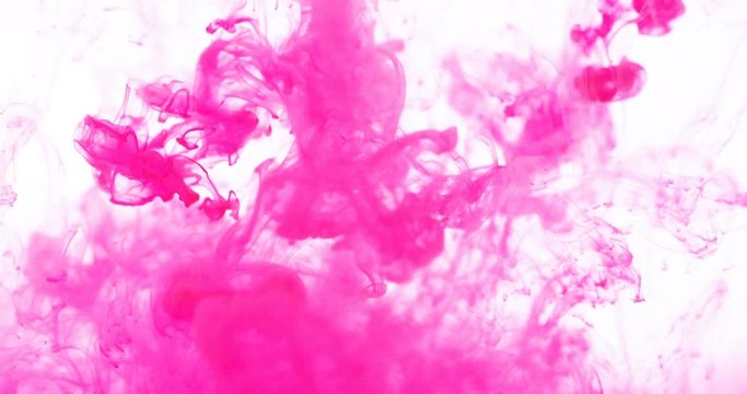 Close up bright pink colored drop in the water , abstract motion movement of watercolor ink splashing background , 4K Dci resolution
