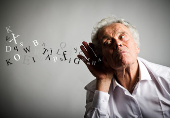 Curious old man in white and letters.