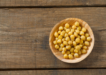 chickpeas on wooden surface