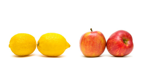 lemons and apples on a white background