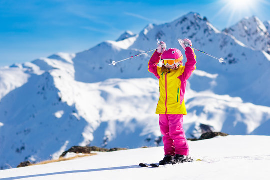 Ski and snow fun. Kids skiing. Child winter sport.