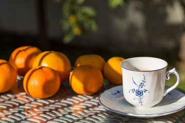 Natural fruits and cup of coffee for a beautiful morning whit the family in the garden
