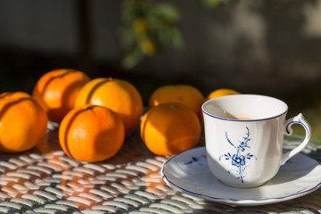 Natural fruits and cup of coffee for a beautiful morning whit the family in the garden