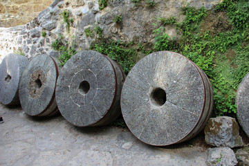 Old millstones. A traditional European tool to mill the flour.