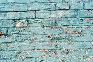 Obraz premium Flaking Blue Paint Old Brick Wall