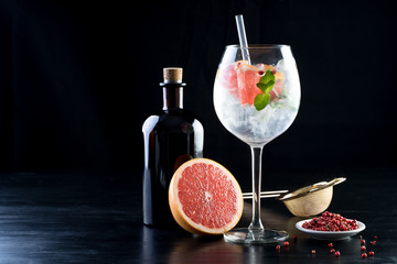 fancy gin and tonic selection drink alcohol cocktail craft fresh fruit spices mint glass bar 