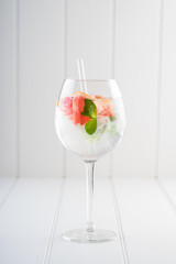 fancy gin and tonic selection drink alcohol cocktail craft fresh fruit spices mint glass bar 