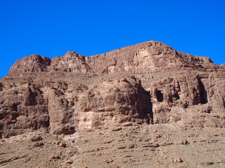 Fototapeta premium Rocky slope of TODGHA GORGE canyon landscape in MOROCCO, eastern part of High Atlas Mountains range at Dades Rivers