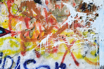 An abstract graffiti on an old abandoned wall