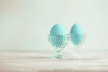 Tender white blue Easter decoration, painted Easter eggs. Copy space, Ester postcard concept.
