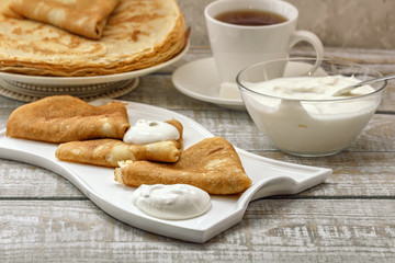 Russian pancakes with sour cream
