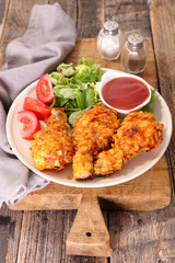 fried chicken and salad