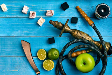 Tobacco background. Turkish smoking hookah with tobacco flavor of ripe green apple and lime