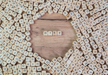 diet name in letters on cube dices on table