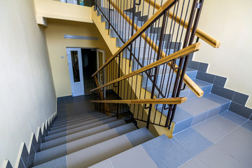 Staircase in residential building. Interior with stairs railing