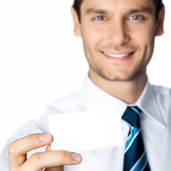 Businessman showing blank business or plastic card