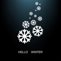 Falling snowflakes paper on a dark background