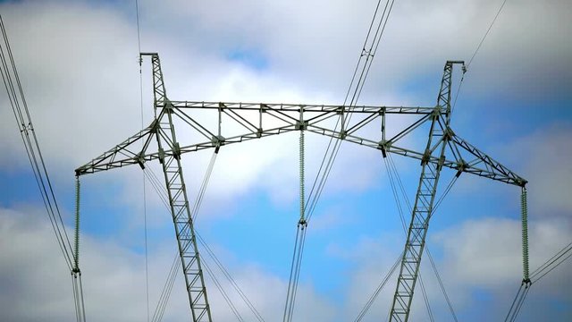 Power line support against the background of the blue sky with clouds