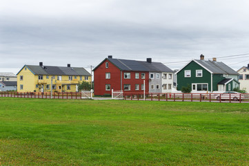 Fototapeta na wymiar Multicolored houses in the town of Vardo, Finnmark, Norway