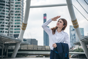 Portraits of beautiful asian woman is walking on outdoor in urban.