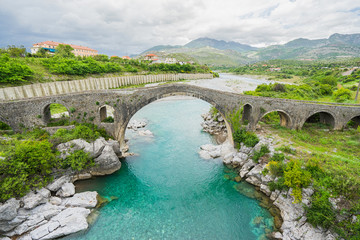 Fototapeta na wymiar Old Mes Bridge (Albanian: Ura e Mesit) near Shkoder in Albania