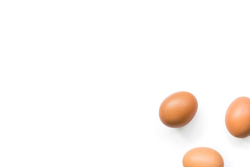 fresh brown organic chicken eggs isolated on white background. Horizontal composition. Top view