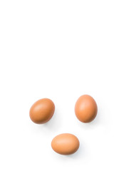 fresh brown organic chicken eggs isolated on white background. Vertical composition. Top view