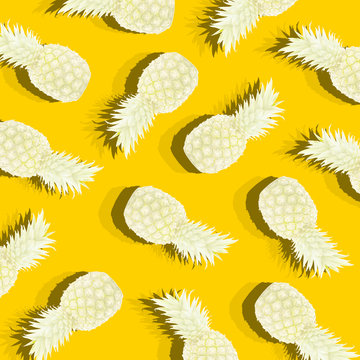 yellow background with image of ripe pineapple