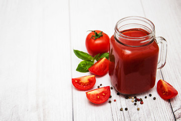 Jars with tomato juice