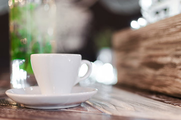 aromatic cup of coffee with smoke