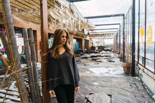 Attractive woman in weathered mall