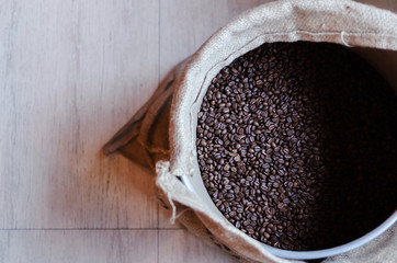 sacks with coffee beans at warehouse