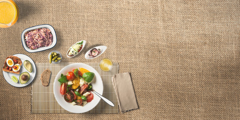 Fototapeta na wymiar fresh vegetable salad and fruit and diet meal top view