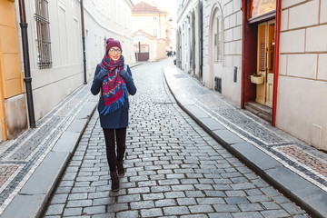 Young woman portrait at winter day in european city
