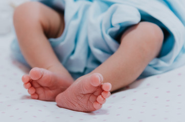 little feet of baby girl who jus born, newborn baby
