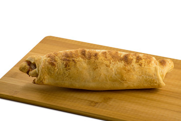 Christmas homemade pastry. Apple strudel (pie) with cinnamon.