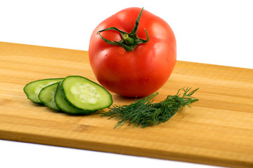 tomato cucumber and dill on a white background