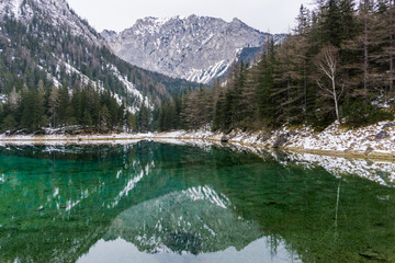 The Austrian Alps reflecting in the waters of the Gruener See