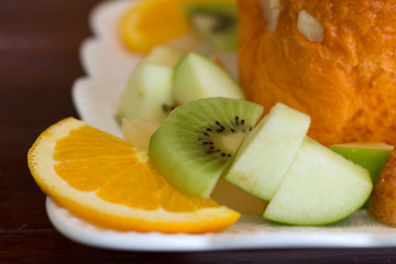 Sliced fruit on wood table,Closeup mix fruit