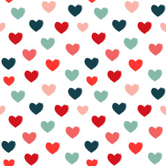 Fototapeta na wymiar Colorful hearts on a white background. Seamless vector pattern.