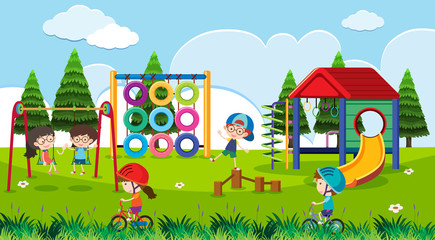 Obraz na płótnie Canvas Playground scene with happy children at daytime