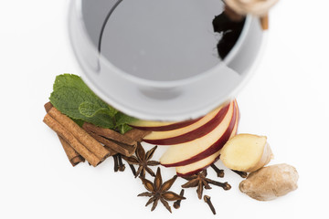 Domestic wine tasting concept. Cinnamon sticks, mint leaves, anise, ginger
